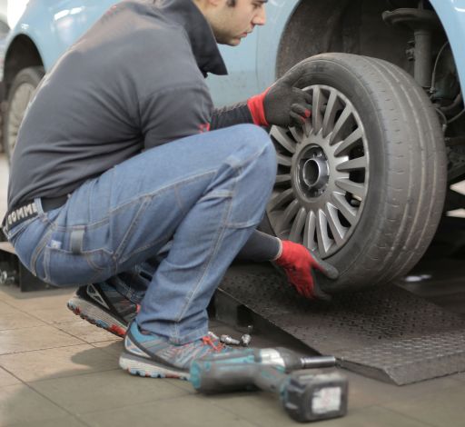 Man changing car tire